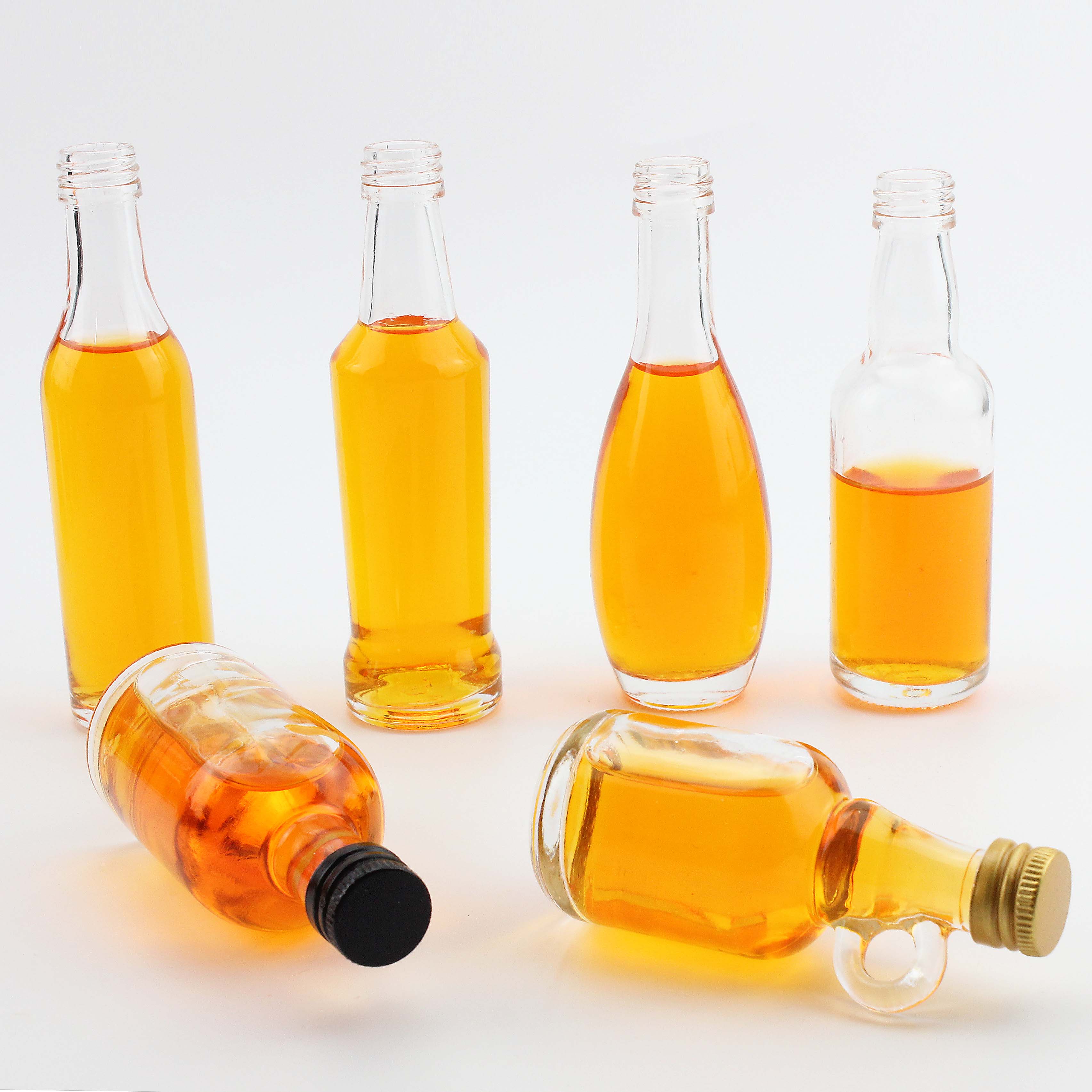 The 2025 Distiller's Guide: 5 Secrets to Awesome Liquor Bottles, from 375 ml to Bulk Minis